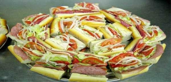 An assortment of oven roasted turkey breast, Italian, freshly roasted top round of beef, tuna salad & vegetarian hoagies. All hoagies are made with provolone cheese, shredded lettuce, tomatoes & oregano. Includes diced onions, pickles, mayonnaise, oil & vinegar on the side.