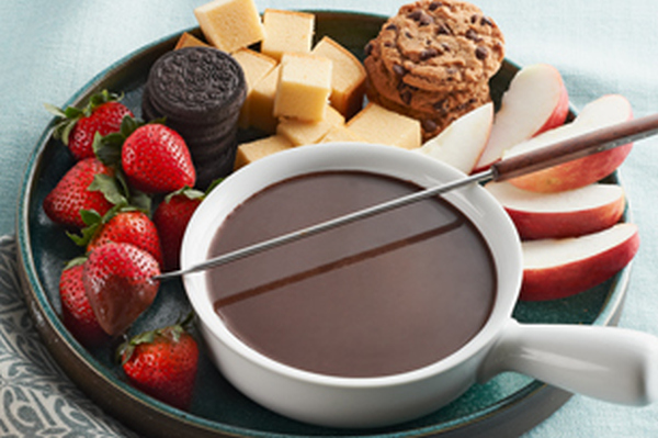 Warm, melted chocolate served with fresh strawberries, pineapple chunks, bananas, cookies, brownie pieces, pound cake, pretzels & marshmallows. A party favorite!