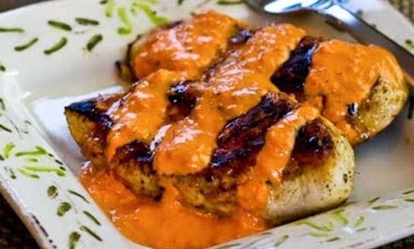 Chicken breasts marinated in our own marinade and grilled to perfection. Served in creamy roasted red pepper sauce.