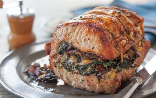 Pork loin stuffed with dried apricots and spinach. Rolled in a spiral and baked to a succulent finish.