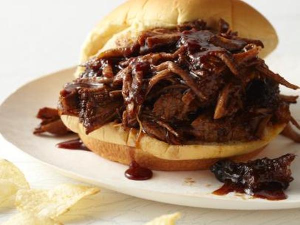 Beef Brisket, rubbed with our house seasoning and slow smoked with hickory wood in our smoker. Served in our smoky Carolina au jus with Colby Jack Cheese & BBQ sauce