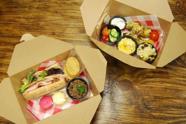 Includes a Classic Mizuna Assortment sandwich, potato salad, fruit salad, 2 cookies, a beverage (served on the side) and condiment packets. Upgrade the sandwich to a Mizuna Gourmet Sandwich for only $2 more per person.